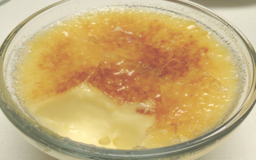 Breaking through the top of the creme brulee.